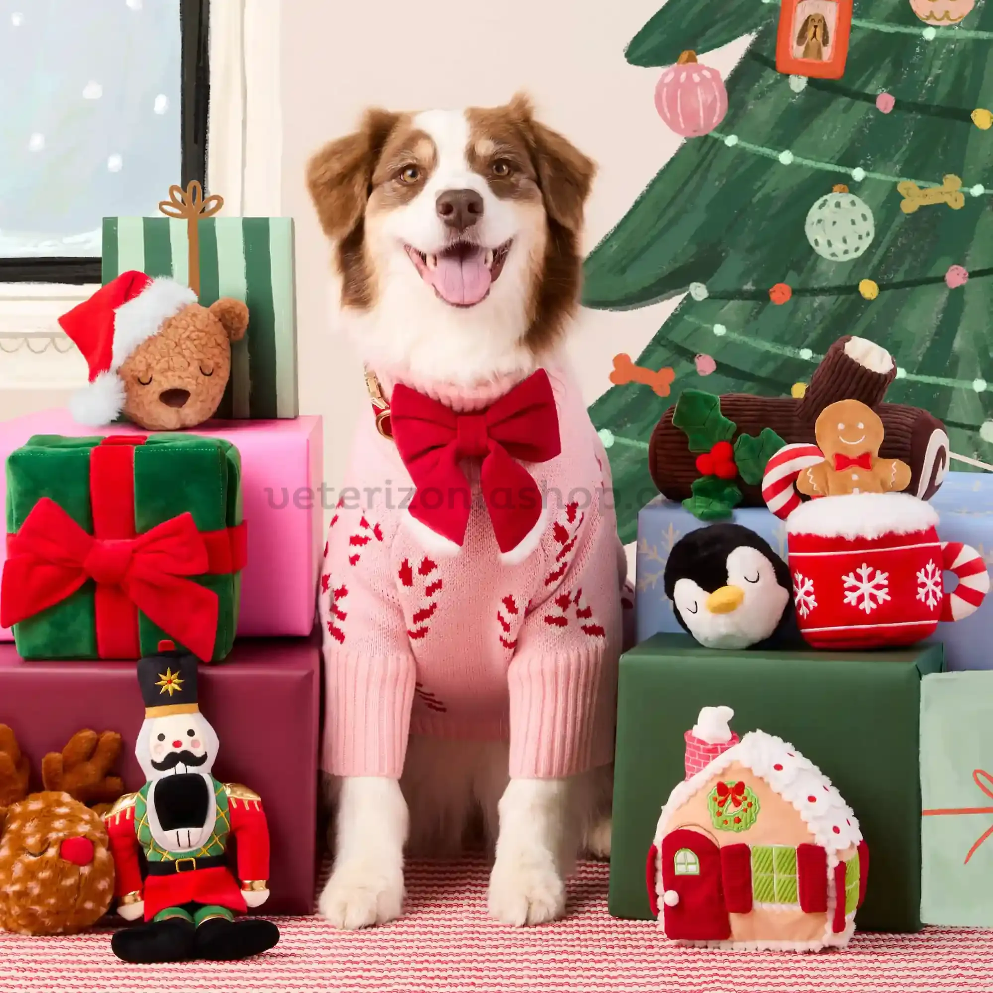 Perro usando el Suéter para perro con bastones de caramelo rosas durante sesión navideña