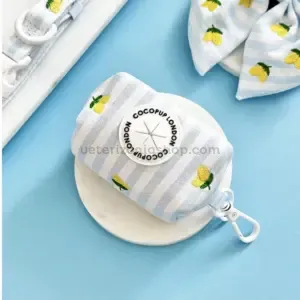 porta bolsas perro rayas azules con limones bordados premium