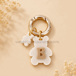 Chapa identificativa personalizada con inicial para perros modelo osito beige con nombre y teléfono grabados