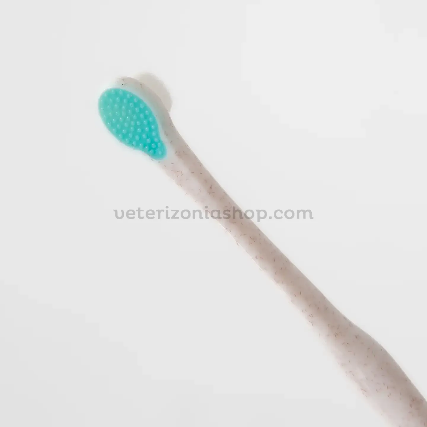 Parte trasera del cepillo dental para perros con limpiador lingual de silicona.
