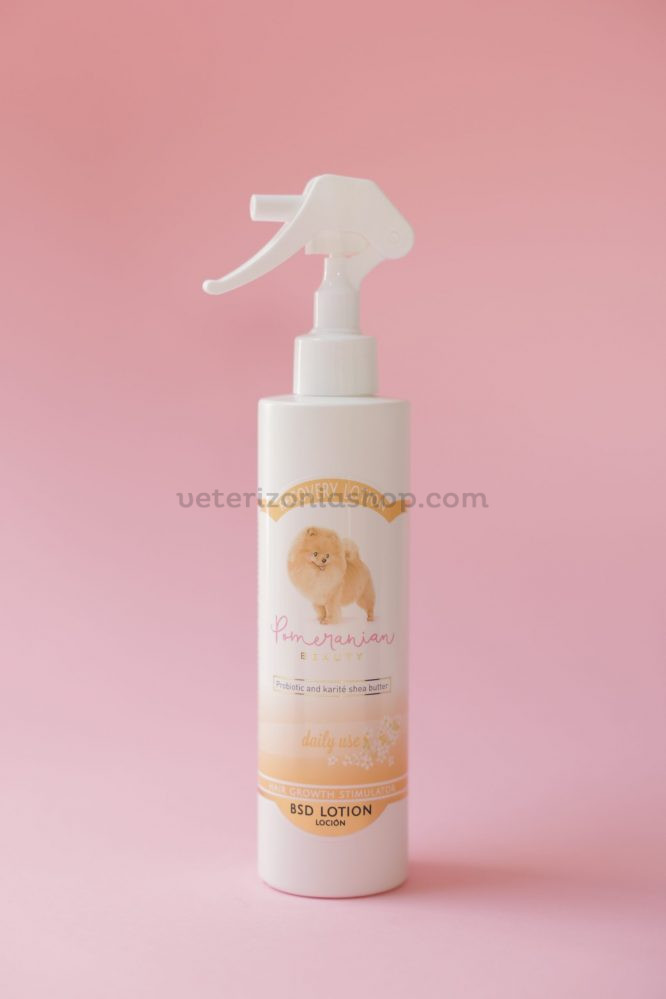 Loción Recovery Lotion Pomeranian Beauty Envase con pulverizador de Recovery Lotion Pomeranian Beauty sobre fondo rosa
