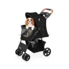 Perro pequeño en el carrito FINU Carbon con capota abierta